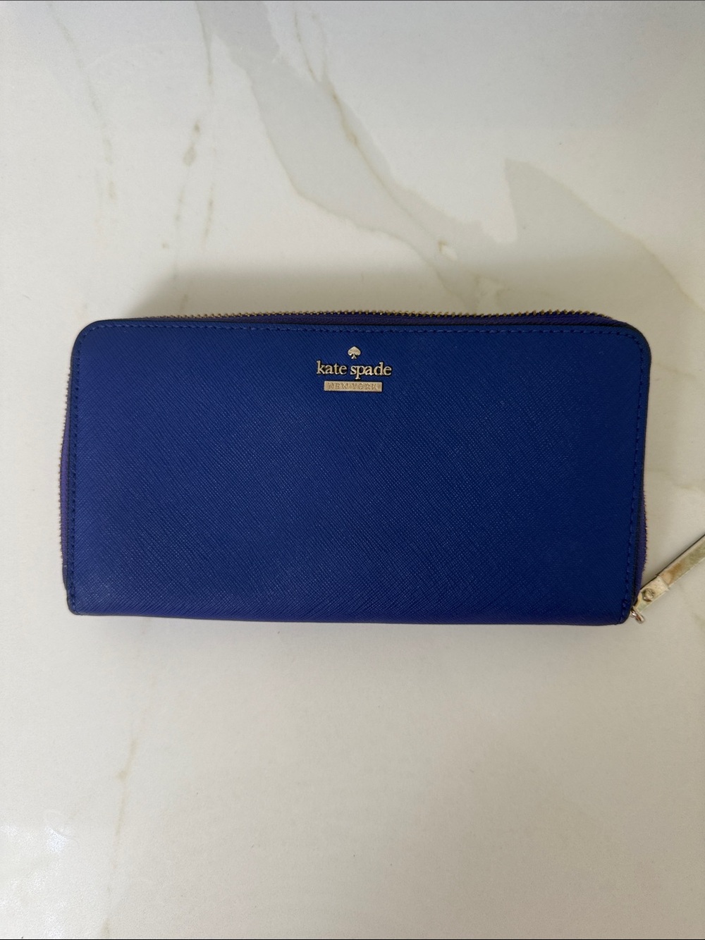 kate spade purple zip-around wallet with gold logo